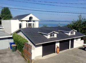 The back side of the previously pictured West Seattle home, showing the detached garage.