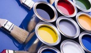 Open paint cans in various colors of paint