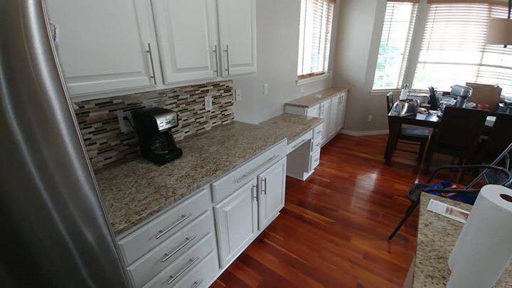 Example cabinet painting project (finished product - the cabinets are now a bright white) from Walls by Design