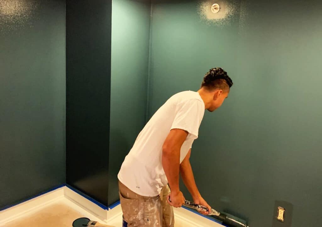 Victor of the Sound Painting Solutions team rolling a wall at one of our interior projects in Capitol Hill, Seattle.