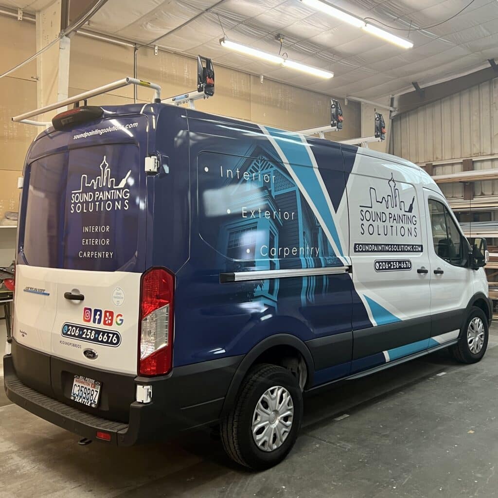 Photo of painting company van after it was wrapped with brand imaging.