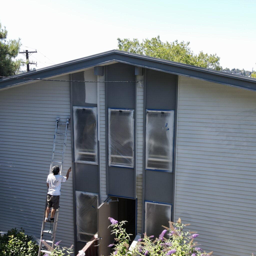 Our painter working on an exterior residential painting job in Seattle.