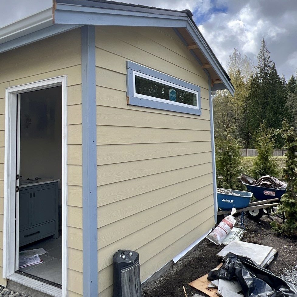 This a photo of newly installed hardieplank siding before painting.