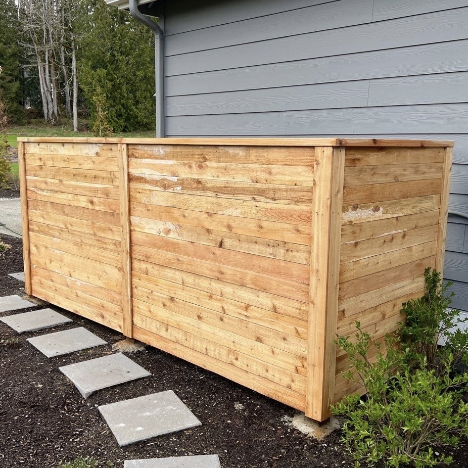 This is a newly installed wood fence before painting.