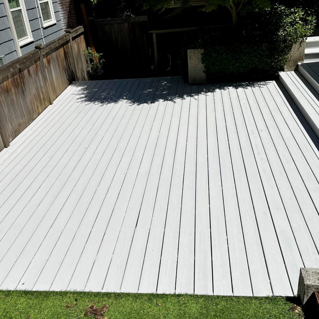 This is a photo of a deck after we applied a solid stain.