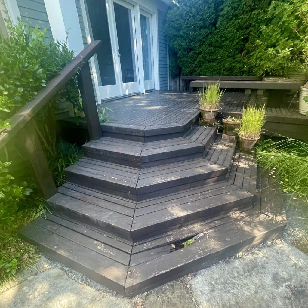 Deck and stair system before demo.