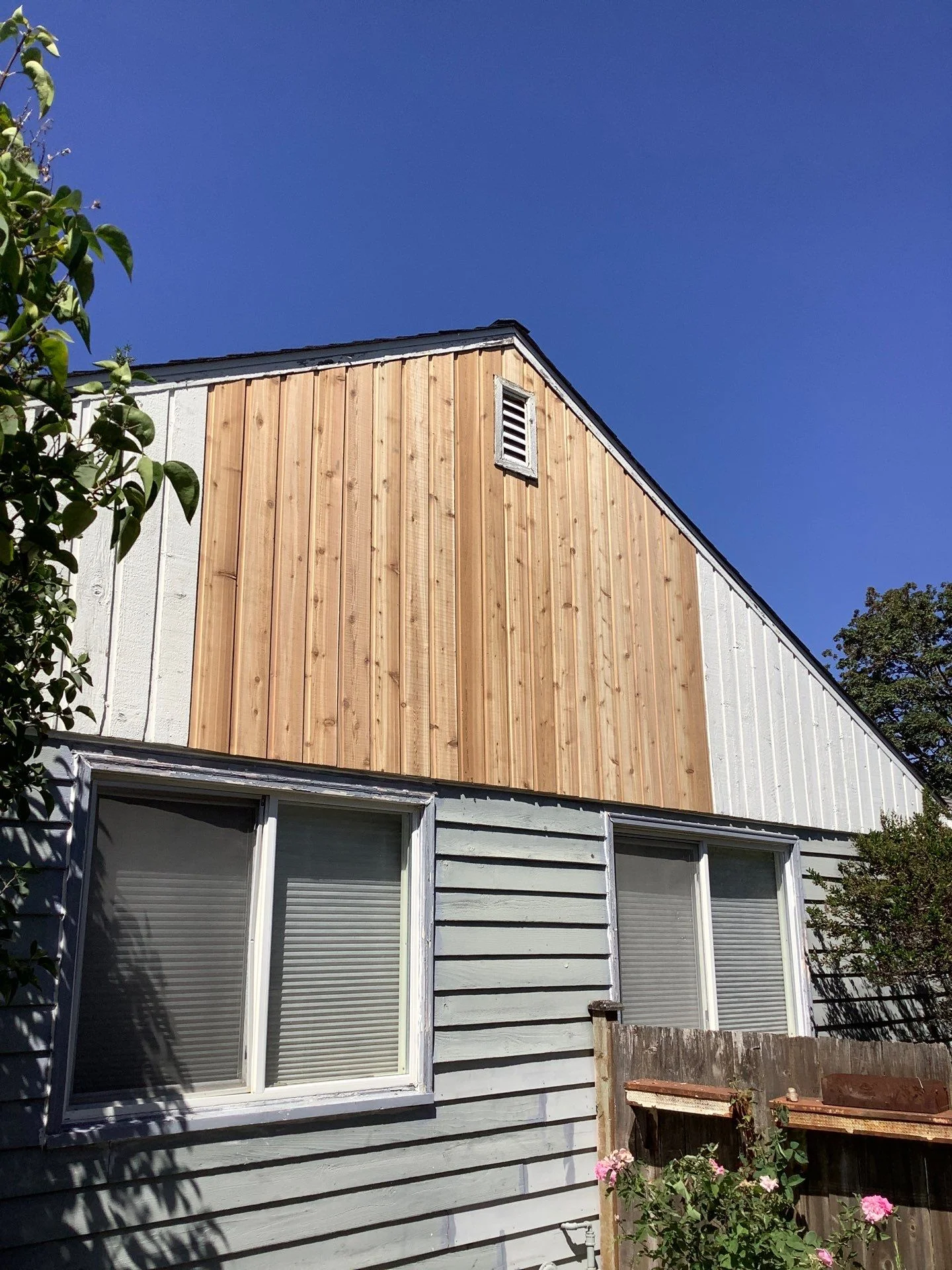 Exterior siding replacement completed by Sound Painting Solutions Carpenters